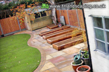 Re-shaped Lawn, Constructed Paved Patio Area and Erected New Fencing
